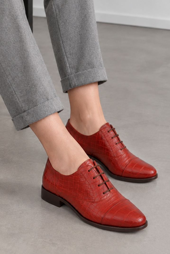 Women's red classic oxfords and derby shoes with round toe and chunky rubber lug sole - Worn view